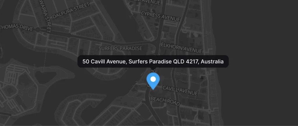 A dark street map showing a location pin at 50 Cavill Avenue in Surfers Paradise.